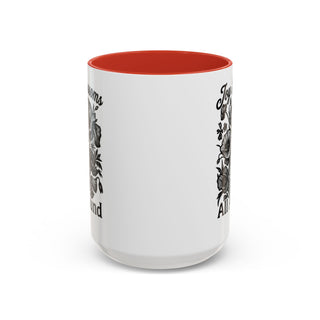 White mug with floral design and text "Joyful Blossoms" and "All Around".