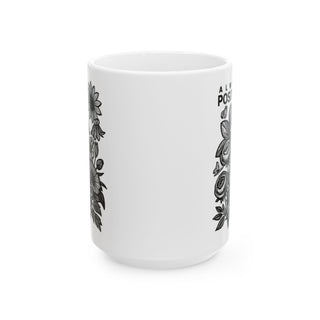 White mug with floral designs and "ALW POSI" text.