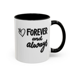 White mug with black handle and interior, featuring "forever and always" text.