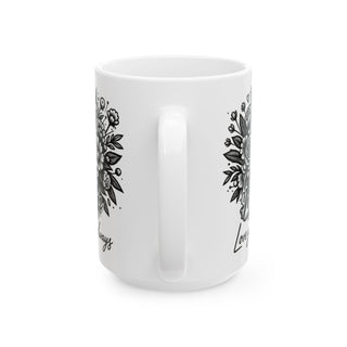 White mug with floral designs and script text that says "Love you always."