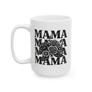 White mug with "MAMA" repeated in large text and floral accents.