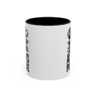 White mug with black interior, featuring floral designs and text.