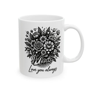 White mug with floral design and "Mom, Love you always" text.