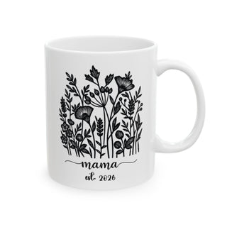 White mug with "mama est. 2026" and floral illustration.