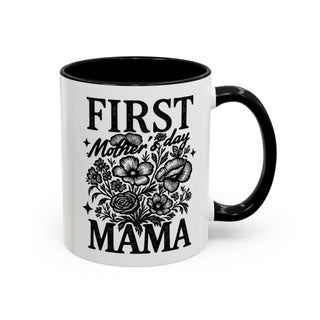 White mug with black interior and handle, featuring floral "First Mother's Day" text design.