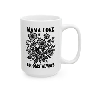 White mug with "Mama Love Blooms Always" text and floral illustration.