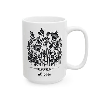 White mug with black floral illustration and "mama est. 2026" text.