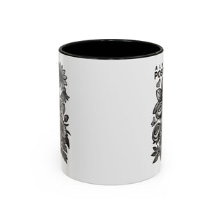 White mug with black interior, featuring floral illustrations and "ALWAYS POSITIVE" text.
