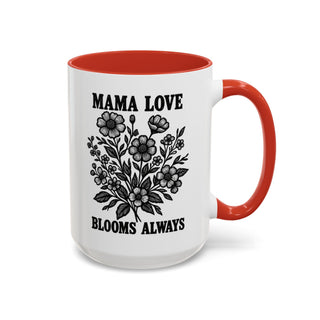 White mug with red interior and handle, featuring floral design and text.