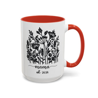 White mug with red interior and handle, featuring floral design and "mama est. 2026" text.
