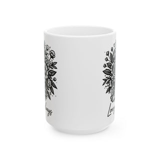 White mug with black floral designs and "Love you always" text.