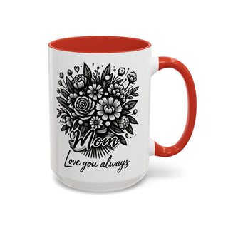 White mug with red handle, featuring a floral bouquet and "Mom, Love you always" text.