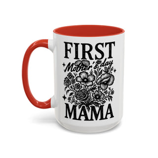White mug with red handle and rim, reading "FIRST Mother's day MAMA" with floral design.