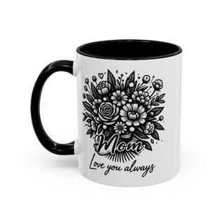White mug with black handle featuring floral bouquet and "Mom, Love you always" text.