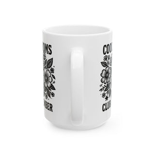 White mug with "Cool Moms Club" and floral design.