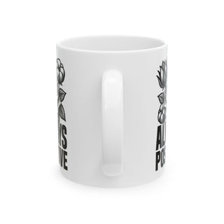 White mug with "always positive" text and floral design.