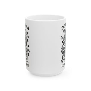 White mug with black floral design and "DEAR MAMA LOVE ALWAYS" text.