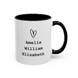 White mug with black rim and handle, featuring a heart and names Amelia, William, Elizabeth.