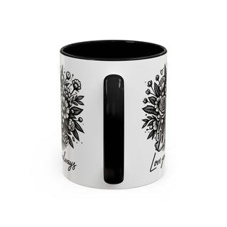 White mug with black interior featuring floral designs and "Love you always" text.