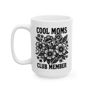 White mug with "COOL MOMS CLUB MEMBER" and floral illustration.