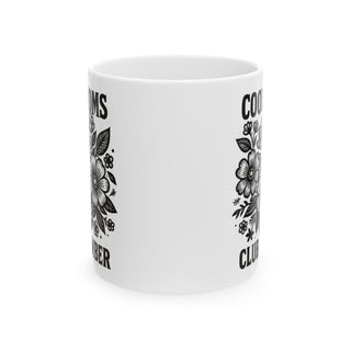 White mug with floral design and text "COOL MOM'S CLUB".