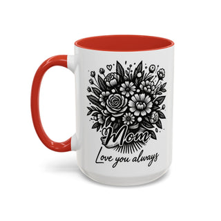 White mug with red handle and rim, featuring a floral design and "Mom, Love you always."