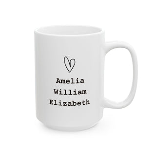 White mug with hand-drawn heart and names Amelia, William, Elizabeth.